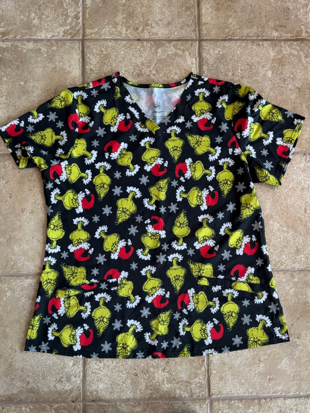 Women’s Black Grinch Holiday Print Scrub Top